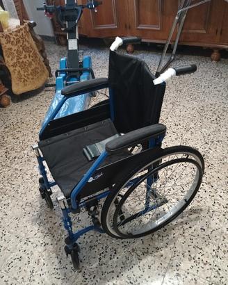 montascale cingolato e sedie a rotelle 