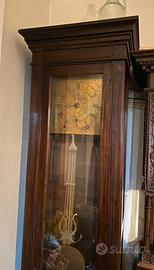 Orologio a pendolo a colonna antico