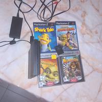 Playstation 2 slim + joystick + giochi