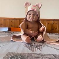 bambola che sembra reale