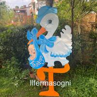 Cicogne in legno per annuncio nascita