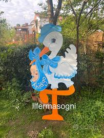 Cicogne in legno per annuncio nascita
