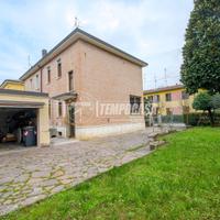 Villetta a schiera con giardino