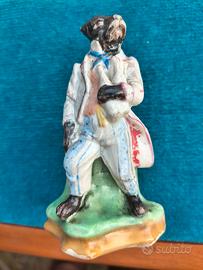 statuetta cane con vestito 