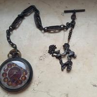 Particolare e raro orologio antico con catena