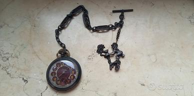 Particolare e raro orologio antico con catena