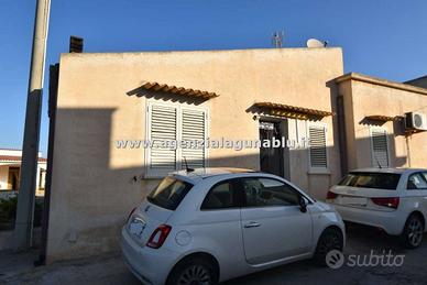 Casa singola con terreno distaccato