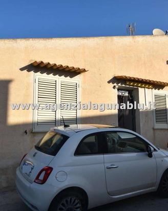 Casa singola con terreno distaccato