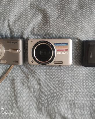 Tre macchine fotografiche Samsung Benq Advent