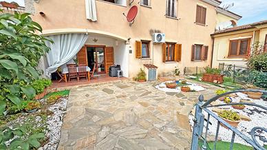 Trilocale piano terra con giardino e posto auto