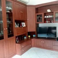 Sala disposta sù 2 pareti con angolo in noce