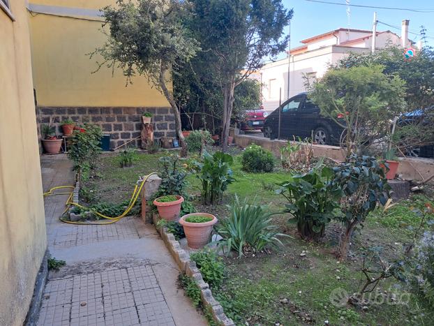 Appartamento rialzato con garage e giardino