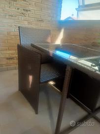 Tavolo in rattan completo di poltroncine