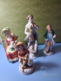 4 statuine porcellana senza marchi