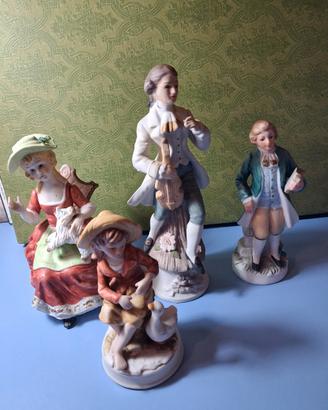 4 statuine porcellana senza marchi