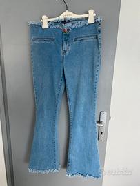 Zuiki  jeans a zampa tg 46 sfrangiati