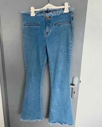 Zuiki  jeans a zampa tg 46 sfrangiati
