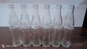 Sei Bottiglie di vetro vintage di Coca-Cola.