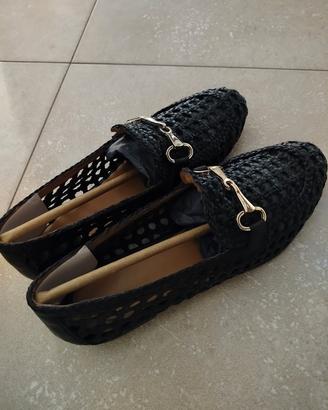 Scarpe artigianali di pelletteria 