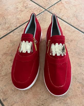 Sneakers slip-on rosse con zeppa interna