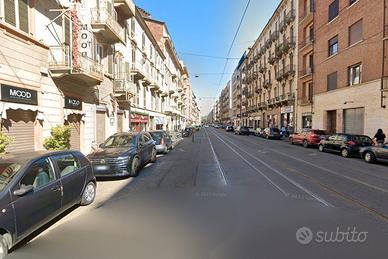 Via cibrario trilocale ristrutturato con box auto