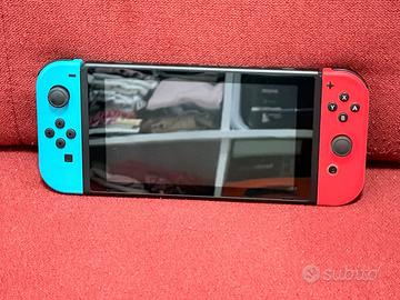 Nintendo Switch + 4 Giochi inclusi. Pari al nuovo.