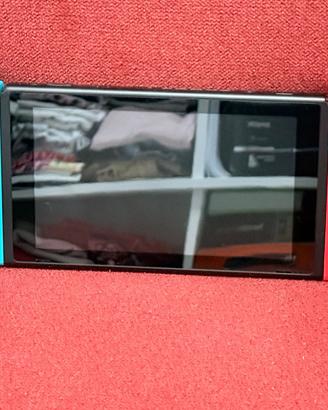 Nintendo Switch + 4 Giochi inclusi. Pari al nuovo.