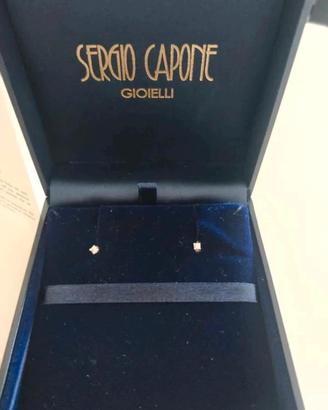 Orecchini punti luce