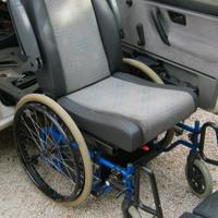Sedile  con carrozzina  Guidosimplex  per disabili