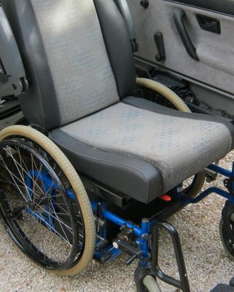 Sedile  con carrozzina  Guidosimplex  per disabili