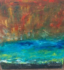 Mare verde spiaggia nera