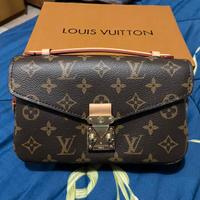 POCHETTE MÉTIS EAST WEST TELA MONOGRAM