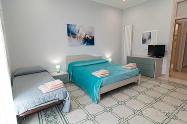 Camera + bagno privato, cucina-soggioro in comune