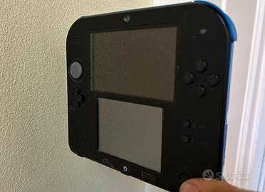 Nintendo 2DS blu con caricatore e 5 giochi