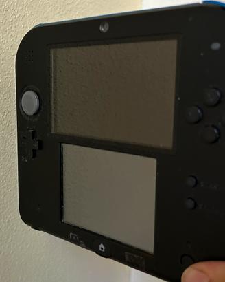 Nintendo 2DS blu con caricatore e 5 giochi