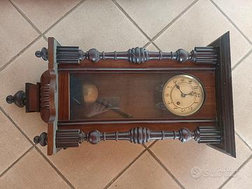 Pendolo antico da parete