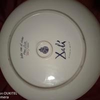 coppia di piatti firmati 