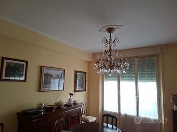 Lampadario in ottone e cristallo