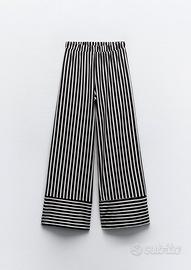Pantaloni a righe a zampa