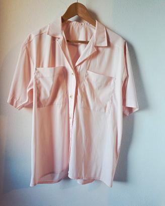 Blusa rosa chiaro.