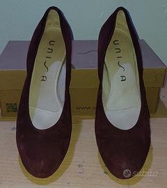 Decolleté affusolate con collo chiuso UNISA