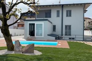 Stanze singole/doppie in villa con piscina