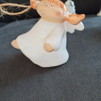 Campana a forma di Angelo