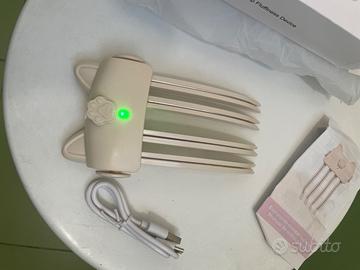 Pinza per sollevare capelli