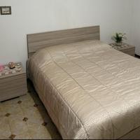 Camere da letto diverse e cucina con elettrodomest