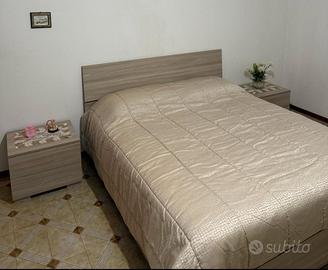 Camere da letto diverse e cucina con elettrodomest