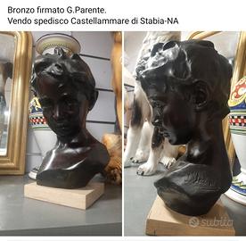 bronzo firma G. PARENTE.patina marroncina ,integro