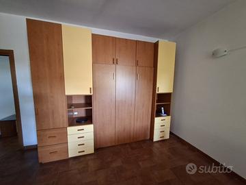 Armadio a muro 6 moduli con contenitore letto