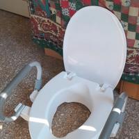Sedile WC rialzato,con maniglie, universale. 