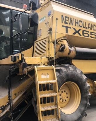 Trattore mietitrebbia new holland tx 65